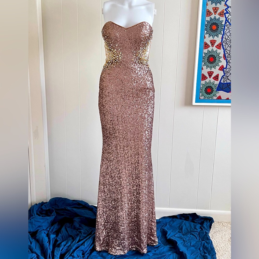 Bronze sequined strapless mermaid gown with mesh peek a boo detail. Sz 0
